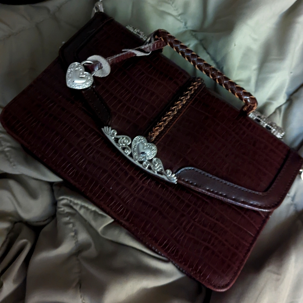 Ornate Cottage core heart fou lether cross body.